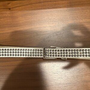 2 belts, one black and one white zadig and voltaire